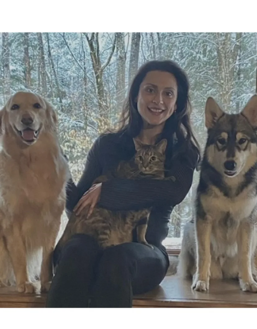 Dr. Shallen Langley with her two dogs and cat